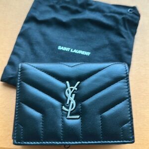 Authentic compact YSL wallet.